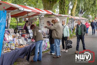 Traditioneel schapenscheren en markt tijdens het schaapscheerdersfeest bij de schaapskooi in Elspeet. - © NWVFoto.nl