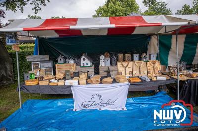 Traditioneel schapenscheren en markt tijdens het schaapscheerdersfeest bij de schaapskooi in Elspeet. - © NWVFoto.nl