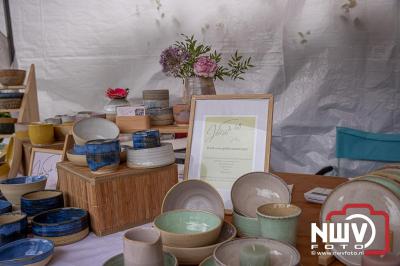 Traditioneel schapenscheren en markt tijdens het schaapscheerdersfeest bij de schaapskooi in Elspeet. - © NWVFoto.nl