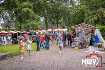 Traditioneel schapenscheren en markt tijdens het schaapscheerdersfeest bij de schaapskooi in Elspeet. - © NWVFoto.nl