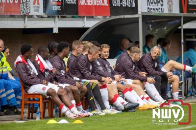 Bezoekers van een afgeladen Sportpark Mulderssingel in Wezep zien Ajax met 2-1 winnen in het oefenduel tegen Rangers FC. - © NWVFoto.nl