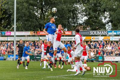 Bezoekers van een afgeladen Sportpark Mulderssingel in Wezep zien Ajax met 2-1 winnen in het oefenduel tegen Rangers FC. - © NWVFoto.nl