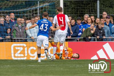 Bezoekers van een afgeladen Sportpark Mulderssingel in Wezep zien Ajax met 2-1 winnen in het oefenduel tegen Rangers FC. - © NWVFoto.nl