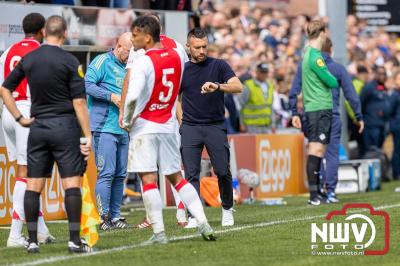 Bezoekers van een afgeladen Sportpark Mulderssingel in Wezep zien Ajax met 2-1 winnen in het oefenduel tegen Rangers FC. - © NWVFoto.nl