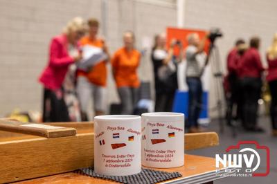 Interland sjoelen in 't Hart van Oosterwolde tussen Nederland, Duitsland en Frankrijk. - © NWVFoto.nl