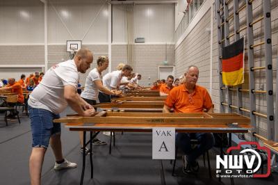 Interland sjoelen in 't Hart van Oosterwolde tussen Nederland, Duitsland en Frankrijk. - © NWVFoto.nl