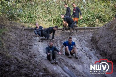 Water, modder, heel veel modder en hindernissen: dat is wat de deelnemers van Mud Master willen ervaren! - © NWVFoto.nl