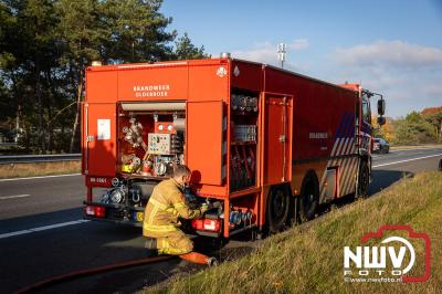 Snelweg A28 volledig afgesloten ter hoogte van 't Harde door vrachtwagenbrand. - © NWVFoto.nl