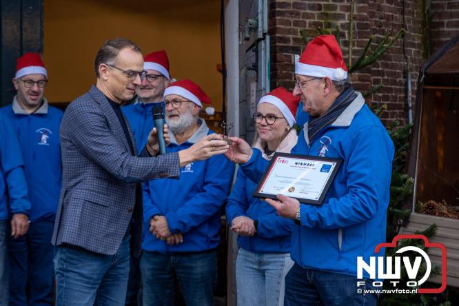 Kerstmarkt rond de molen Oostendorp, organisatie wint vrijwilligerscompliment 2025 gemeente Elburg. - &copy; NWVFoto.nl