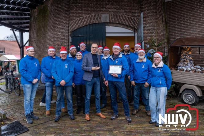 Kerstmarkt rond de molen Oostendorp, organisatie wint vrijwilligerscompliment 2025 gemeente Elburg. - &copy; NWVFoto.nl