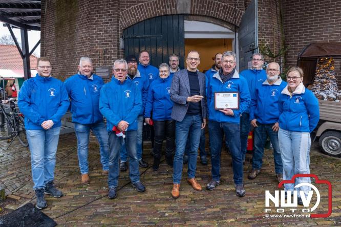 Kerstmarkt rond de molen Oostendorp, organisatie wint vrijwilligerscompliment 2025 gemeente Elburg. - &copy; NWVFoto.nl