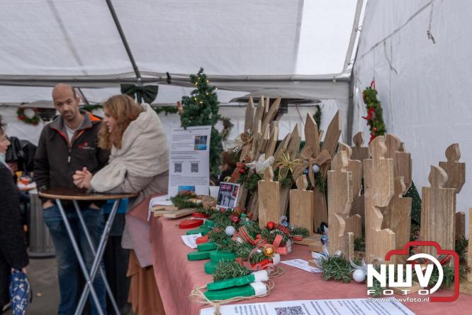 Kerstmarkt rond de molen Oostendorp, organisatie wint vrijwilligerscompliment 2025 gemeente Elburg. - &copy; NWVFoto.nl