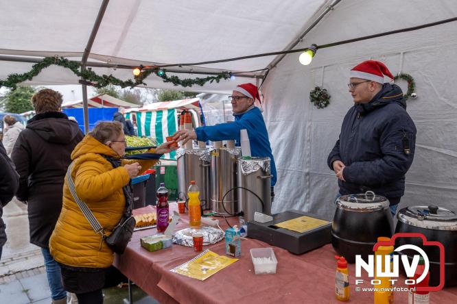 Kerstmarkt rond de molen Oostendorp, organisatie wint vrijwilligerscompliment 2025 gemeente Elburg. - &copy; NWVFoto.nl