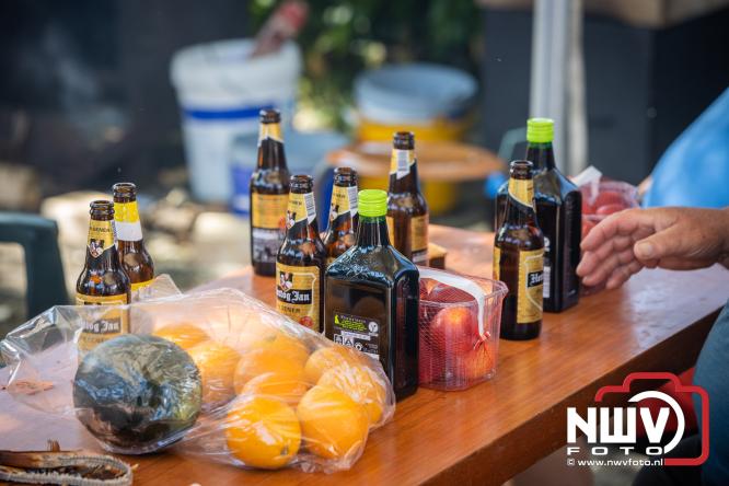Rookpluimen, paling en zomerse gezelligheid kleuren Noordeinde tijdens rookwedstrijd 2026. - &copy; NWVFoto.nl