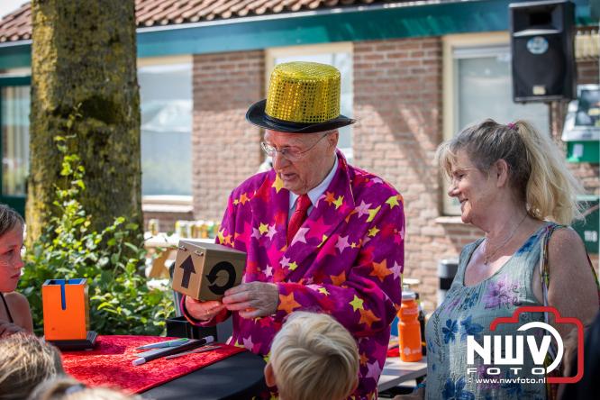 Rookpluimen, paling en zomerse gezelligheid kleuren Noordeinde tijdens rookwedstrijd 2026. - &copy; NWVFoto.nl