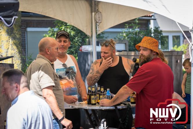 Rookpluimen, paling en zomerse gezelligheid kleuren Noordeinde tijdens rookwedstrijd 2026. - &copy; NWVFoto.nl