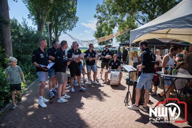 Rookpluimen, paling en zomerse gezelligheid kleuren Noordeinde tijdens rookwedstrijd 2026. - &copy; NWVFoto.nl