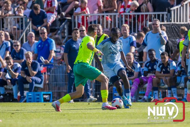 3500 toeschouwers genieten in Hulshorst van de wedstrijd AEK Lanarca tegen AFC Ajax. - &copy; NWVFoto.nl