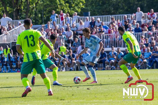 3500 toeschouwers genieten in Hulshorst van de wedstrijd AEK Lanarca tegen AFC Ajax. - &copy; NWVFoto.nl