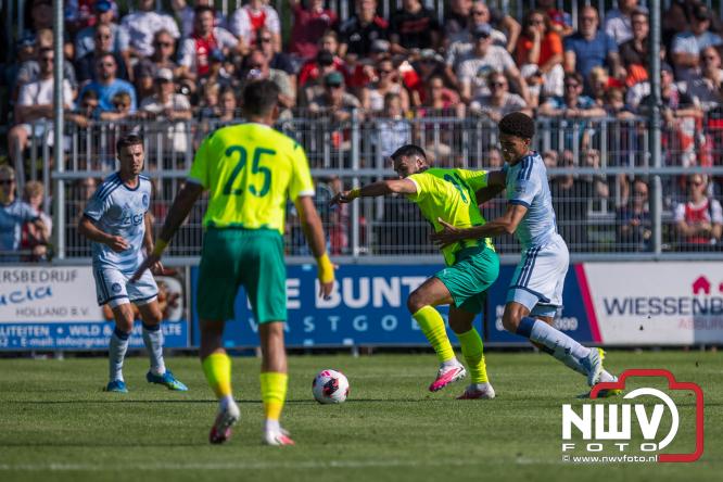 3500 toeschouwers genieten in Hulshorst van de wedstrijd AEK Lanarca tegen AFC Ajax. - &copy; NWVFoto.nl