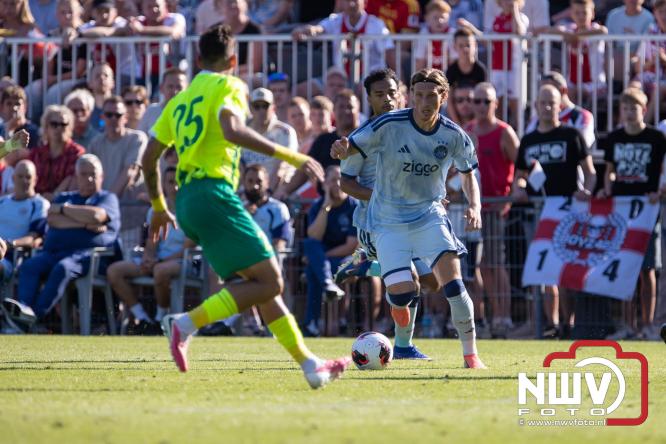 3500 toeschouwers genieten in Hulshorst van de wedstrijd AEK Lanarca tegen AFC Ajax. - &copy; NWVFoto.nl